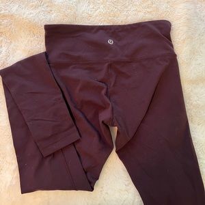 Lululemon deep purple low waisted leggings size 4